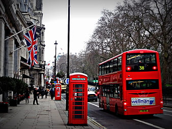 London street scene with red double-decker bus and telephone box