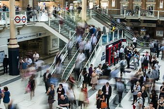 Busy London Underground Station with Motion Blur Crowd
