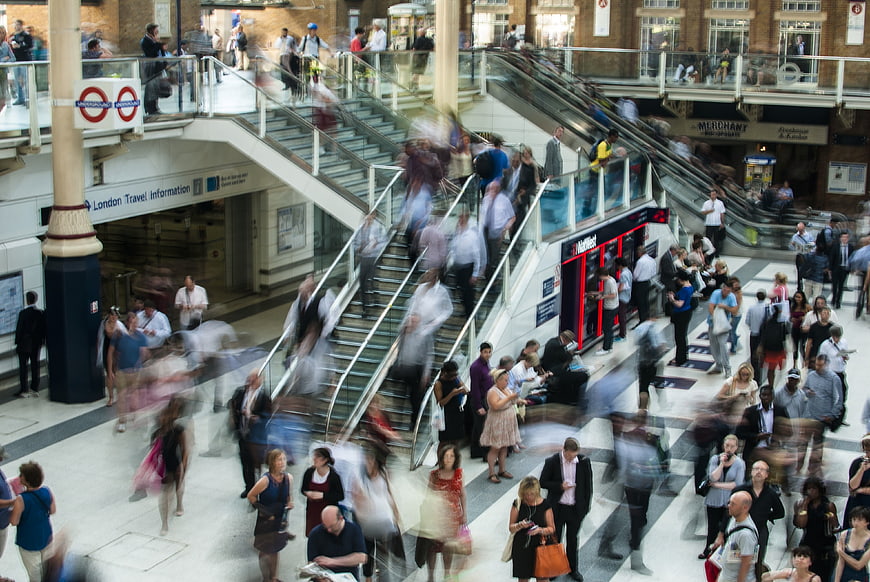 Busy London Underground Station with Motion Blur Crowd