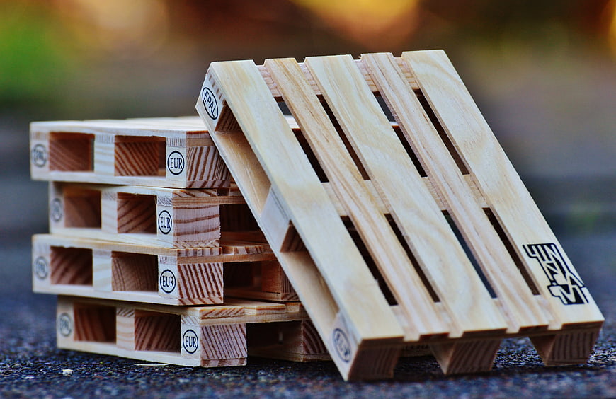 Stack of wooden EUR pallets for logistics and transport