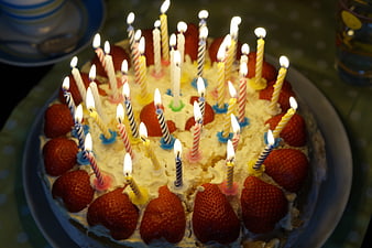Strawberry Birthday Cake with Lit Candles