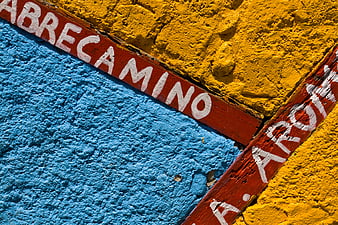 Colorful Cuban Street Sign on Textured Wall