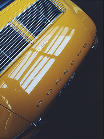 Close-up of Vintage Yellow Porsche 911S Hood and Grille