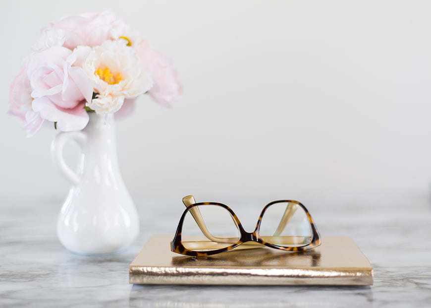 Tortoiseshell Reading Glasses on Gold Book with Pink Peonies