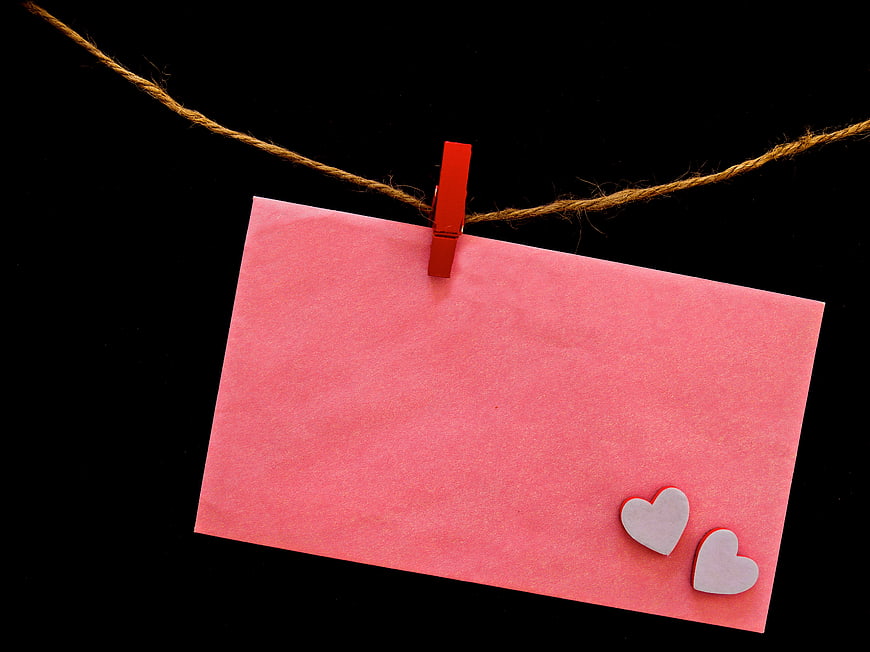 Pink Card with Hearts Hanging on Twine