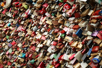 Colorful Love Locks on Bridge Railing