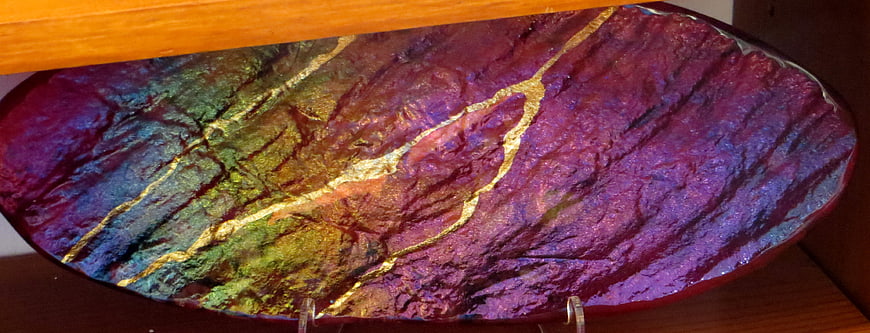 Iridescent Bismuth Crystal with Golden Fractures