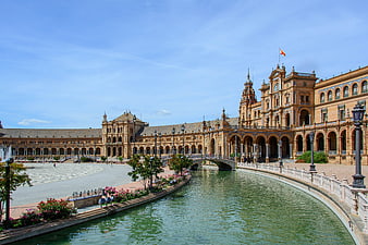 Plaza de España in Seville, Spain with canal and historic architecture