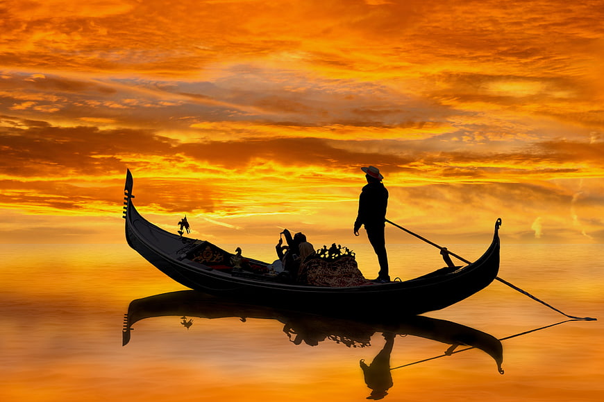 Silhouette of Gondola in Venice at Golden Sunset