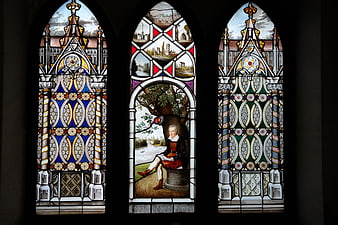 Ornate Gothic Stained Glass Window with Portrait