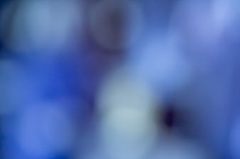 Abstract Blue Bokeh Background with Soft Focus Light