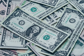 Scattered US Dollar Bills Close-Up