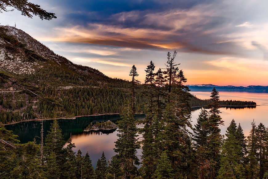 Sunset over Emerald Bay Lake Tahoe with Pine Trees