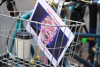 Political Protest Sign in Bicycle Basket
