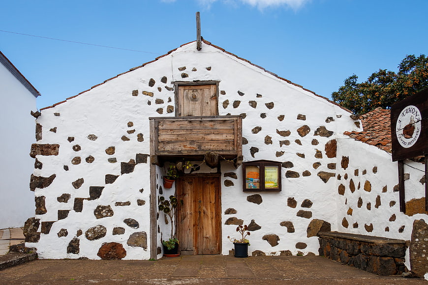 Traditional white stone house facade in Spanish village
