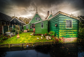 Traditional Green Dutch Houses by Canal in Zaanse Schans