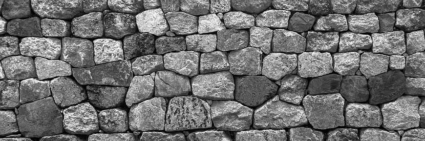 Black and white stone wall texture background