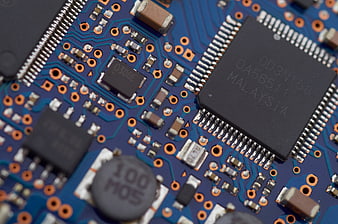Macro Close-Up of Blue Computer Circuit Board Components