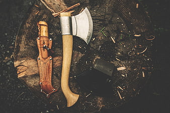 Wooden Hatchet and Leather Sheath on Tree Stump