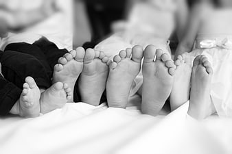 Barefoot Children's Feet Together in Black and White