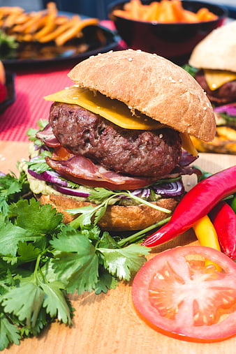 Gourmet Burger with Cheddar, Bacon, and Guacamole