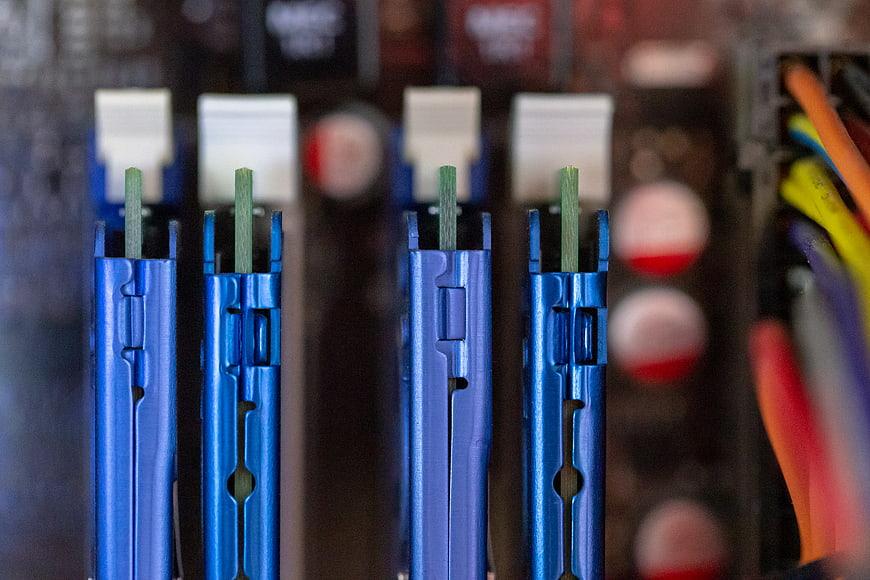 Close-up of blue RAM slots on a computer motherboard