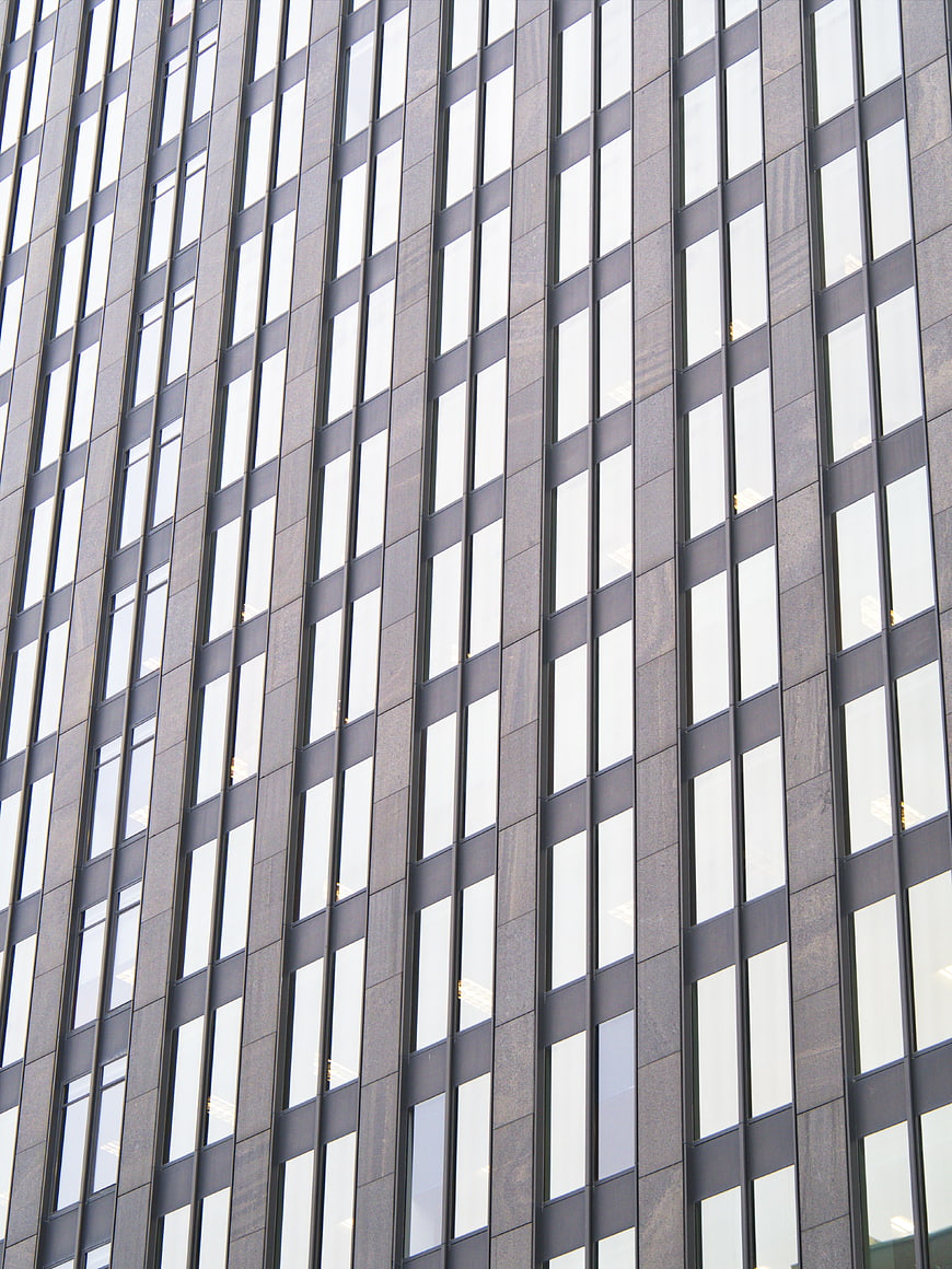 Modern Office Building Facade with Vertical Window Pattern