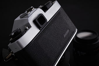 Vintage Silver SLR Camera on Black Background