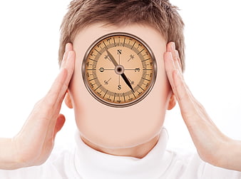 Conceptual man with compass on face representing confusion and lost direction