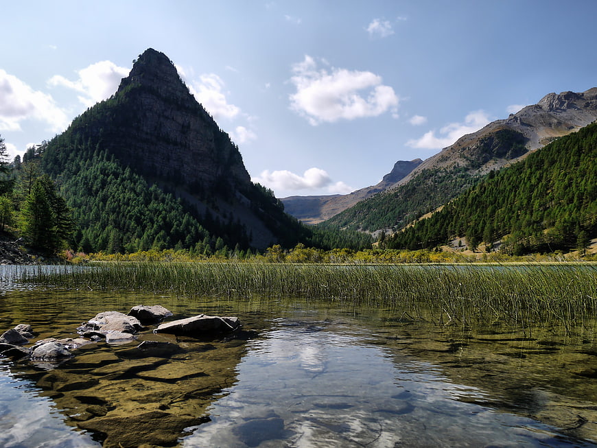 Scenic Alpine Lake with Clear Water and Mountain Reflections