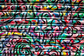 Colorful Abstract Spray Paint Pattern On Metal Shutter