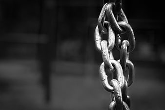 Close-up of Heavy Industrial Metal Chain Links in Black and White
