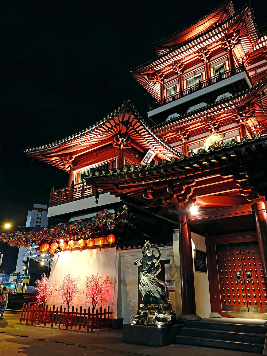 Illuminated Traditional Asian Temple at Night