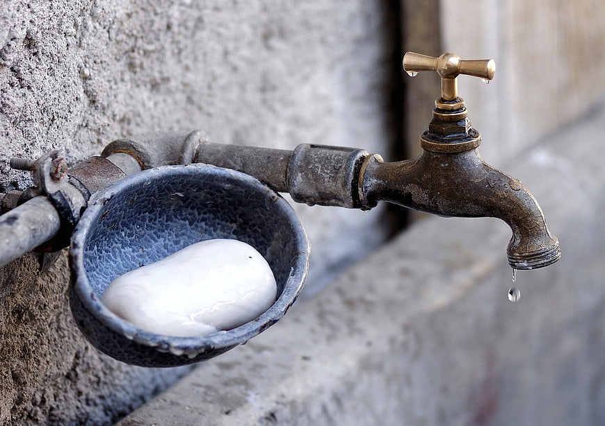 Rustic Outdoor Water Tap With Soap Bar In Metal Basin