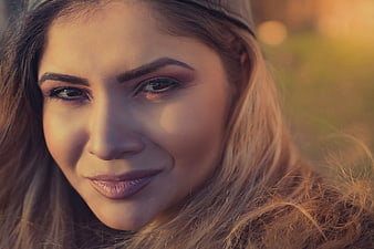 Close-up Portrait of Woman with Golden Hour Lighting