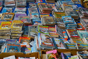 Vintage magazines and books at a flea market stall