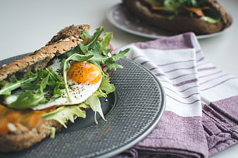 Healthy Baguette Sandwich with Fried Egg and Arugula