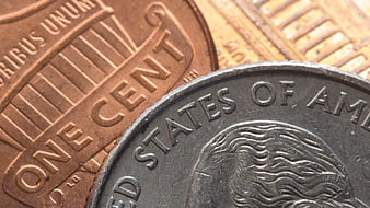 Macro Close-Up of US Penny and Nickel Coins