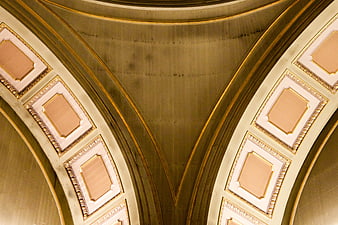 Abstract Gold and Cream Arched Ceiling Architecture