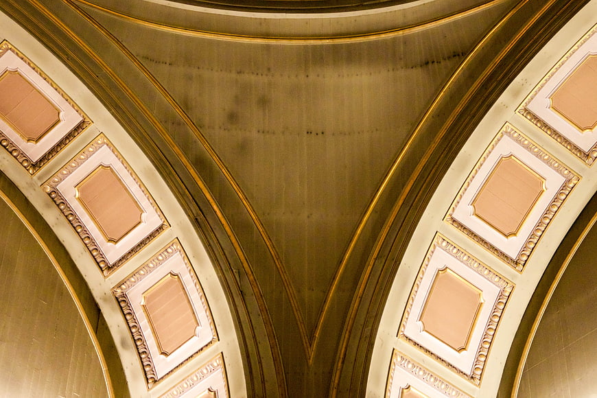 Abstract Gold and Cream Arched Ceiling Architecture