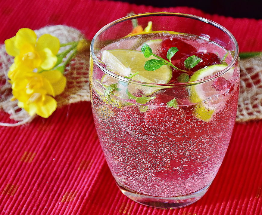 Refreshing Raspberry Spritzer With Lime And Mint Garnish
