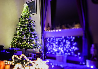 Decorated Christmas Tree with Blue Bokeh Lights