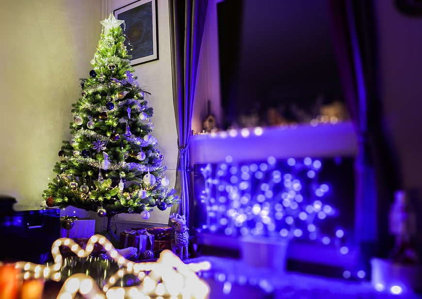 Decorated Christmas Tree with Blue Bokeh Lights