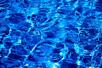Vibrant Blue Swimming Pool Water Texture Background