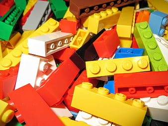 Colorful pile of mixed plastic building blocks
