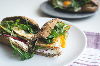 Healthy Baguette Sandwich with Fried Egg and Arugula