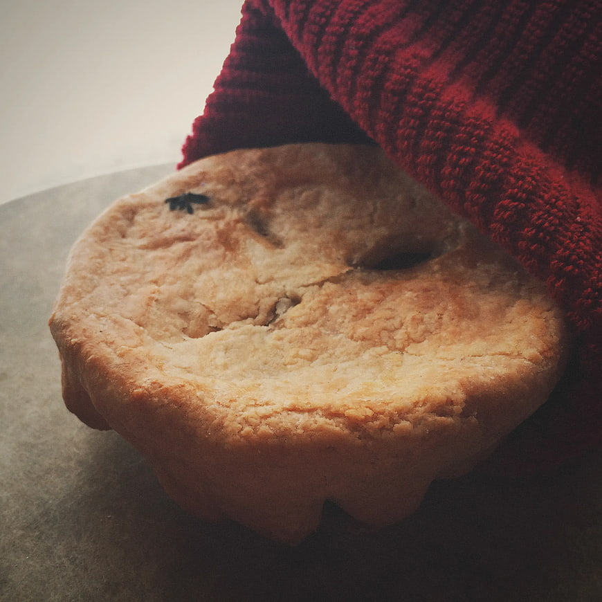 Homemade Pie Under Red Knitted Blanket