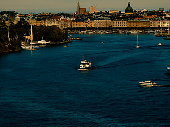 Stockholm Cityscape with Boats on Blue Water