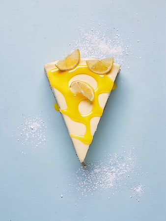 Lemon Cheesecake Slice on Blue Background