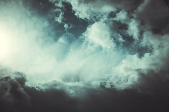 Dramatic Storm Clouds With Teal Tint And Dark Moody Atmosphere